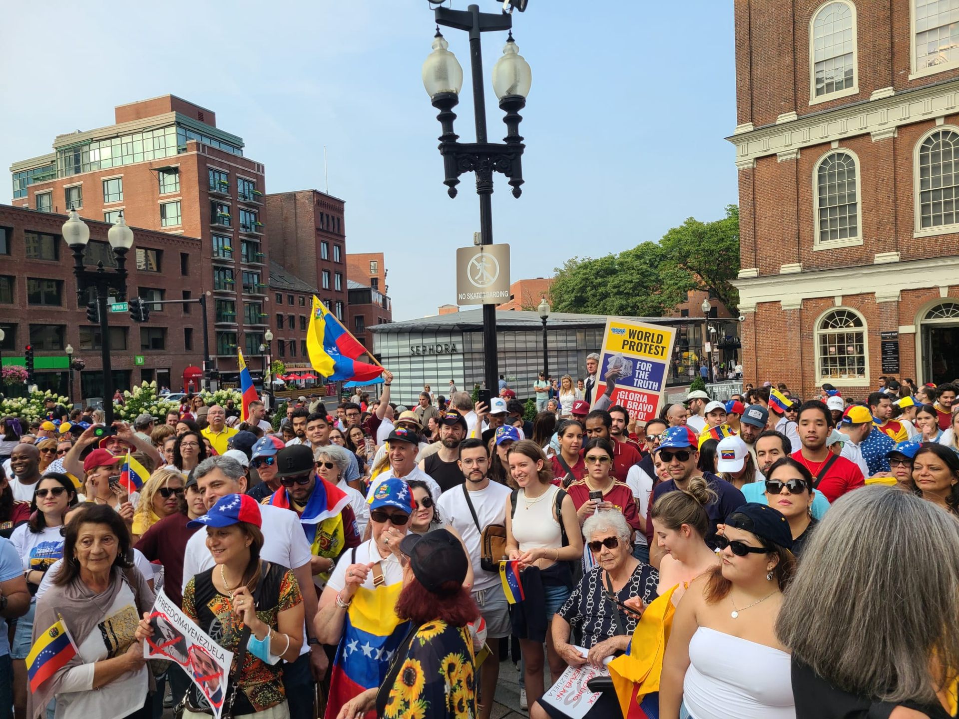 Venezuelan community rally with flags in Boston